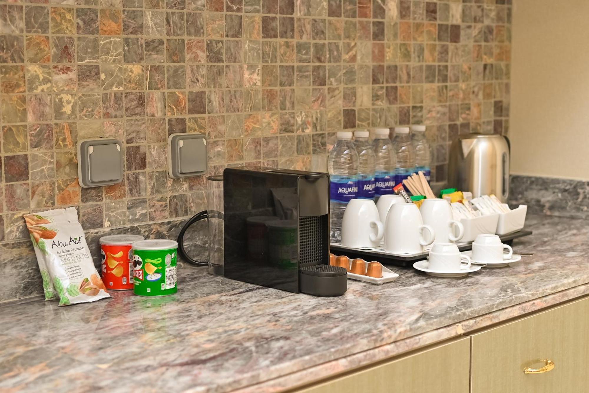 Hilton Hurghada Plaza Hotel Bagian luar foto A Nespresso coffee machine